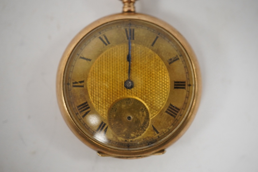 A George V 9ct gold open faced fob watch, with Roman dial and subsidiary seconds(hand loose), with 9ct gold cuvette, case diameter 34mm, gross weight 27.2 grams. Condition - poor to fair